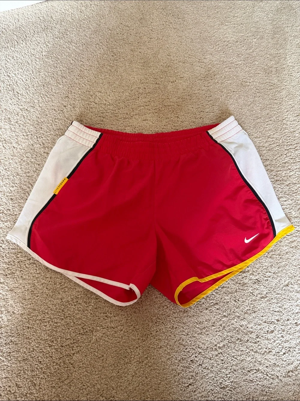 Nike Women's Red Athletic Shorts with White and Yellow Trim